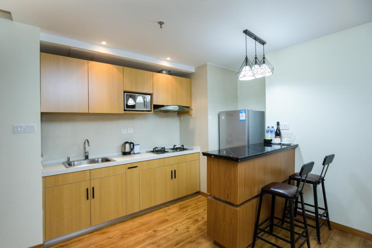 Wuxi Koschenny Graceland Service Residence מראה חיצוני תמונה